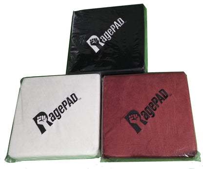 Three RagePADs in black, white, and red, each with a fist logo, designed for gamers.