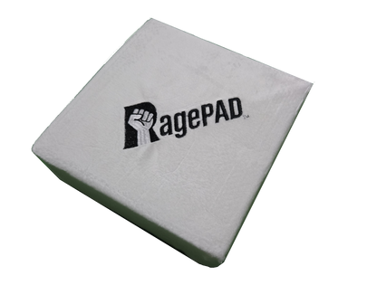 White square gamer rage pad with black RagePAD logo on the surface